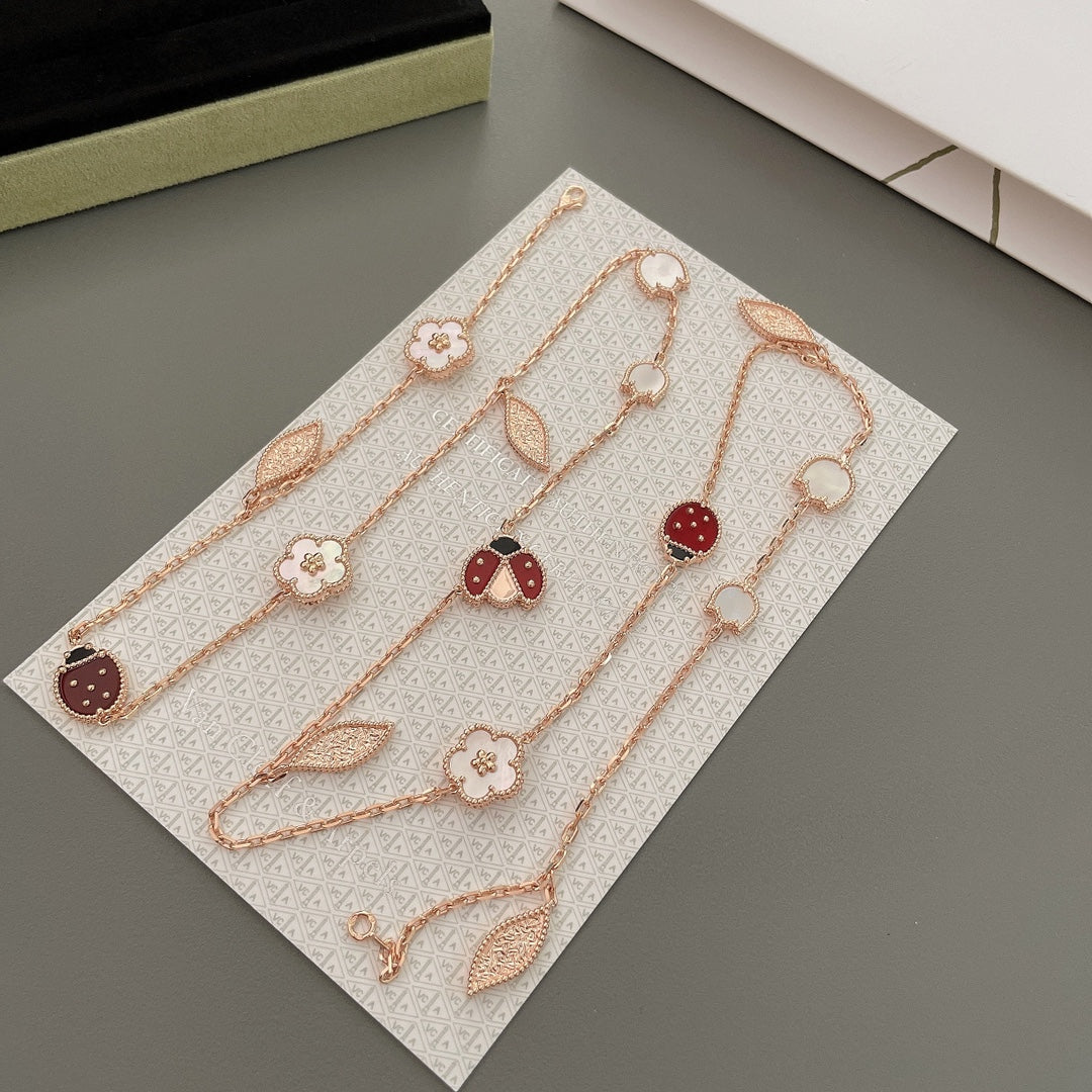 [⭐⭐JeweliWhal]GLÜCKS-FRÜHLINGS-HALSKETTE MIT 15 MOTIVEN IN ROSÉGOLD