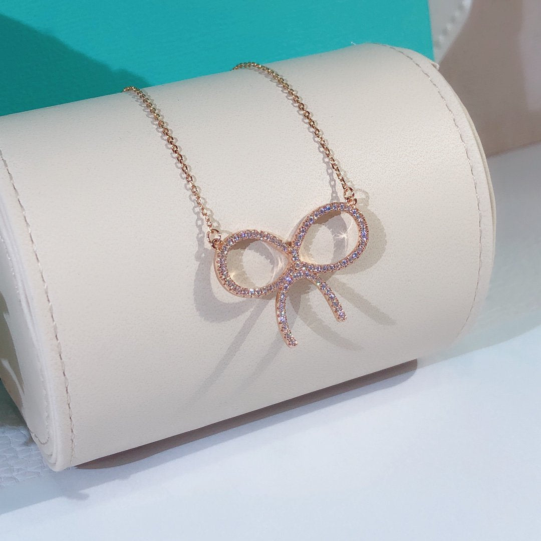 [JeweliWhal]CLAW SET RHODIUM PLATED BOW NECKLACE