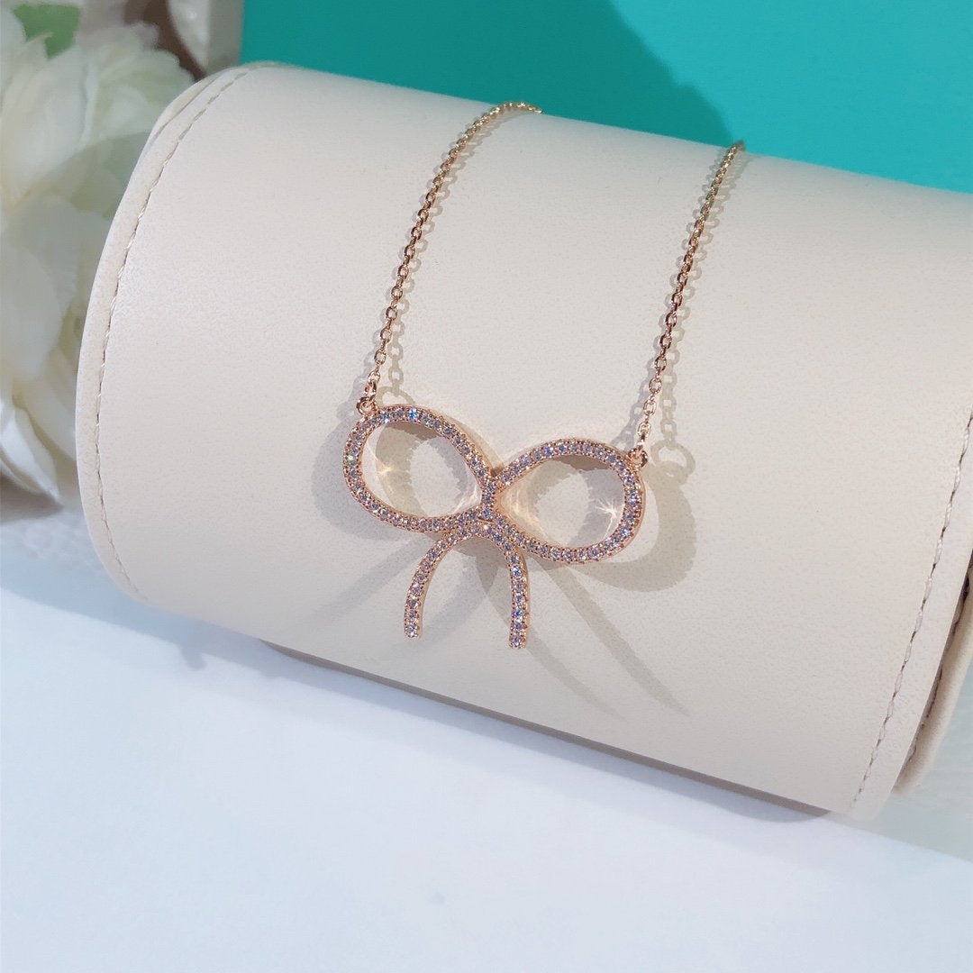 [JeweliWhal]CLAW SET RHODIUM PLATED BOW NECKLACE