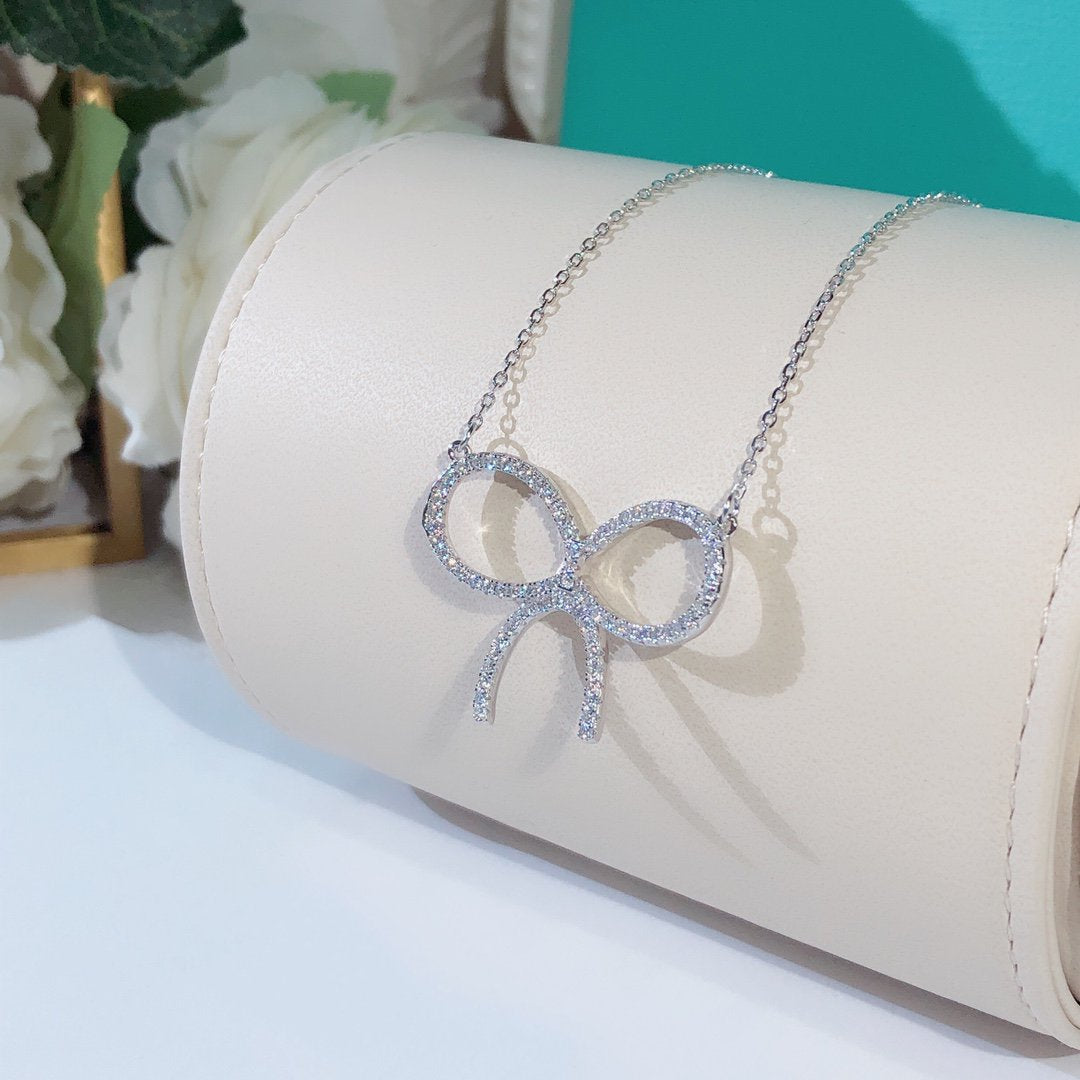 [JeweliWhal]CLAW SET RHODIUM PLATED BOW NECKLACE