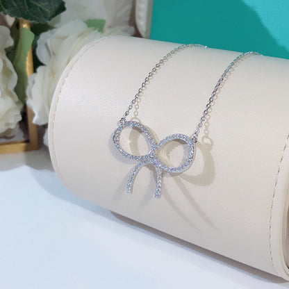 [JeweliWhal]CLAW SET RHODIUM PLATED BOW NECKLACE