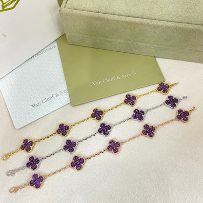 [⭐⭐JeweliWhal]NEUES ARMBAND MIT VIERBLÄTTRIGEM KLEEBATT UND 5 BLÜTEN AUS LILA SANDGOLD