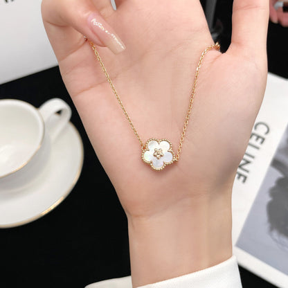 [⭐⭐JeweliWhal]GLÜCKSBRACELETT MIT WEISSEM PERLMUTT-BLÜTENMUSTER