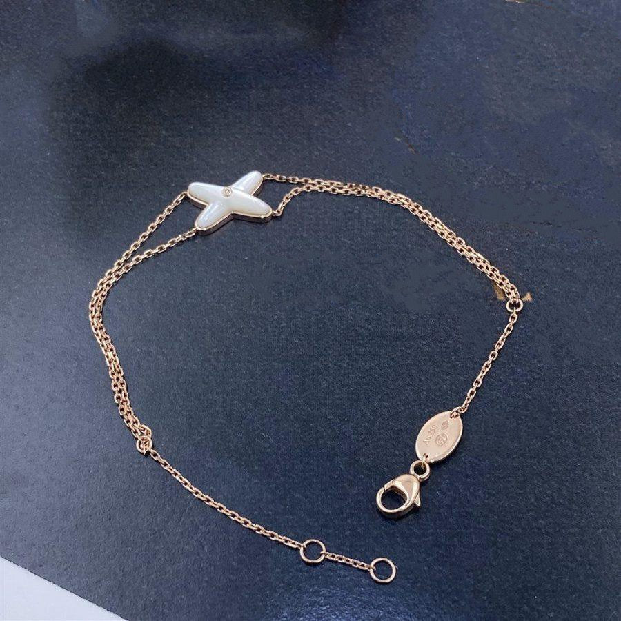 [⭐⭐JeweliWhal]JEUX ARMBAND WEISSES PERLMUTT ROSÉGOLD 1 DIAMANT