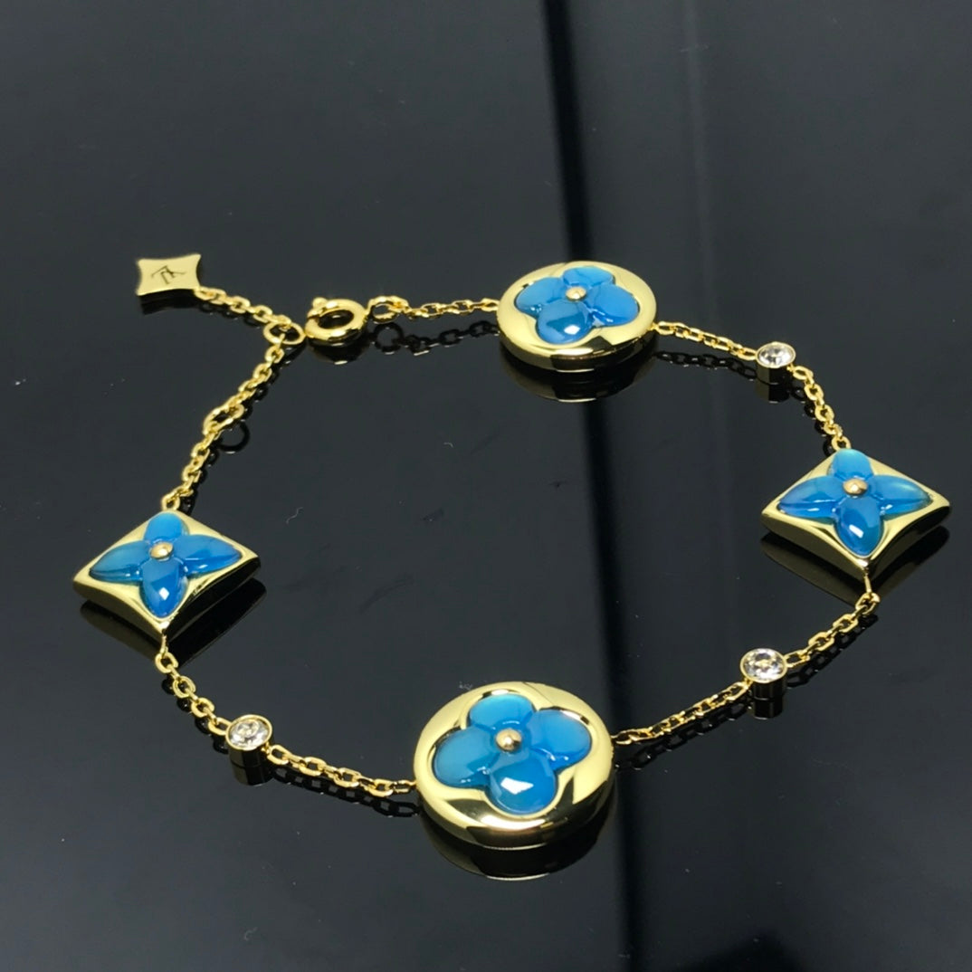 [⭐⭐JeweliWhal]STERN- UND SONNEN-ARMBAND MIT 4 MOTIVEN IN BLAU