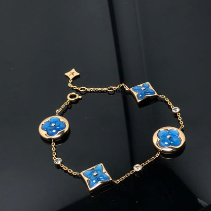 [⭐⭐JeweliWhal]STERN- UND SONNEN-ARMBAND MIT 4 MOTIVEN IN BLAU