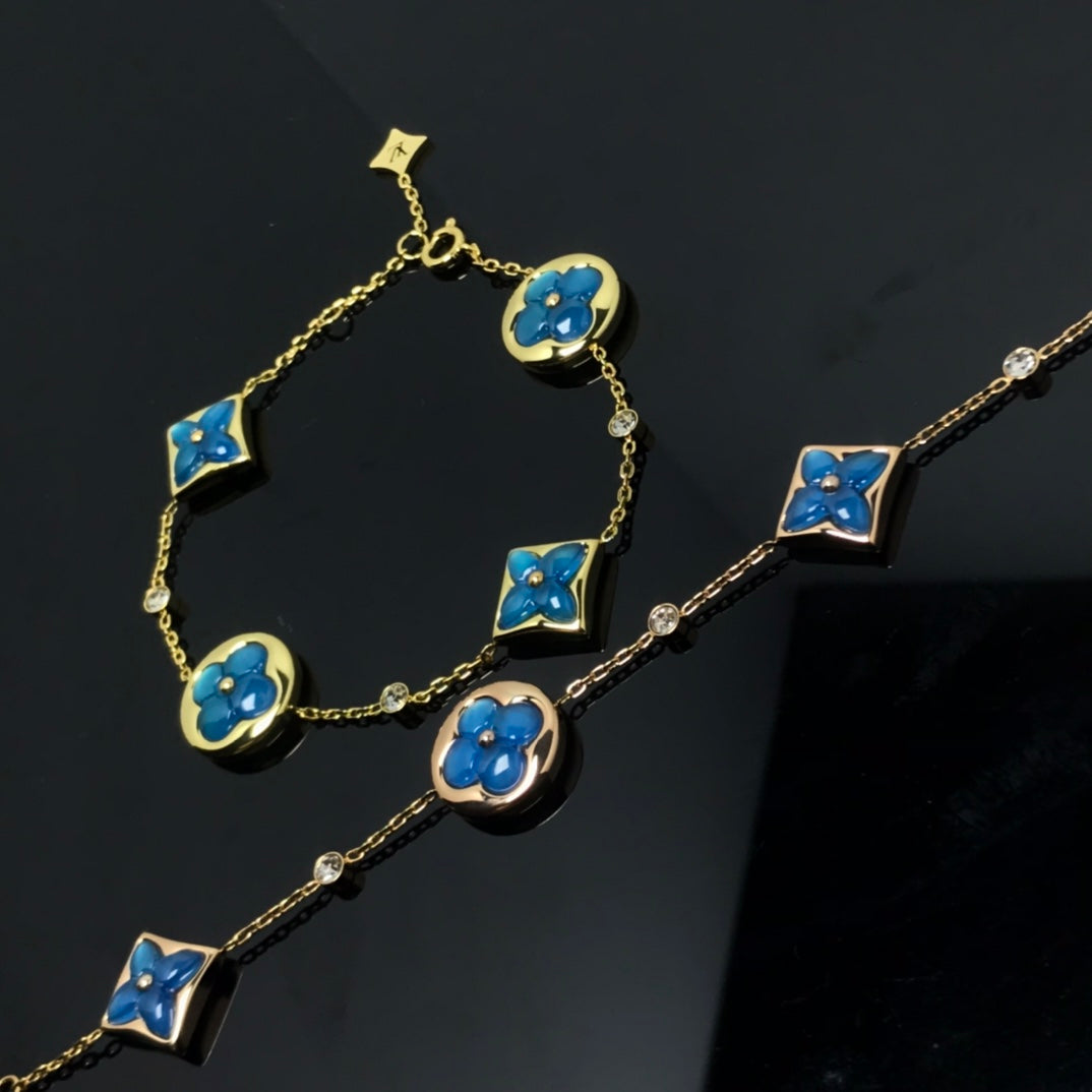 [⭐⭐JeweliWhal]STERN- UND SONNEN-ARMBAND MIT 4 MOTIVEN IN BLAU